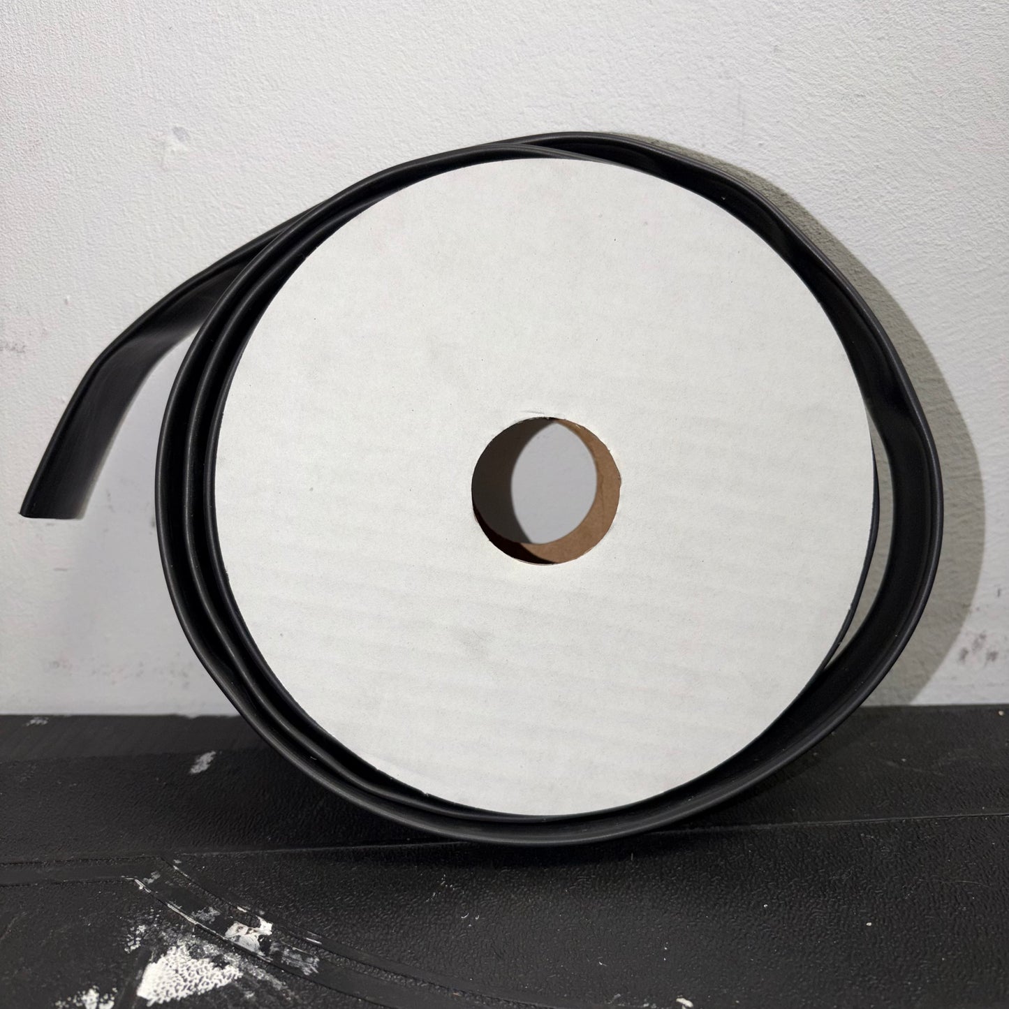 Black Dual Wall Adhesive Lined Heatshrink Tubing Spool Side Angle View