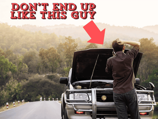 Man frustrated by a broken-down car highlighting the need for reliable auto electrics from MURE