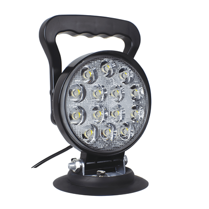 Three-quarter view of the WL100M LED mag lamp showing the textured lens and heavy-duty black housing.