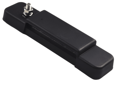 Angled view of the fully assembled black power block, demonstrating the sleek, low-profile design for compact wiring in vehicle engine bays or marine cabins.