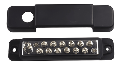 Top-down view showing the 12-point terminal screw layout on the brass bus bar alongside its corresponding black insulating cover.