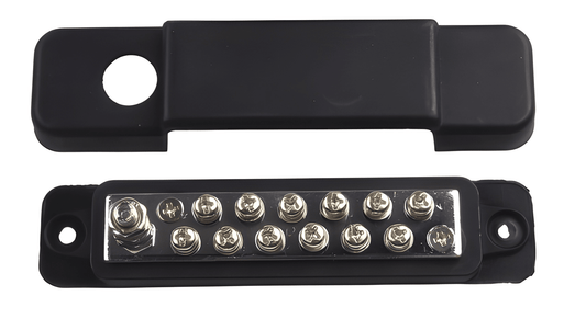 Top-down view showing the 12-point terminal screw layout on the brass bus bar alongside its corresponding black insulating cover.