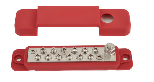 The red MURE distribution block shown with its matching ABS protective cover and main power stud exposed, highlighting the low-profile design for vehicle engine bays.