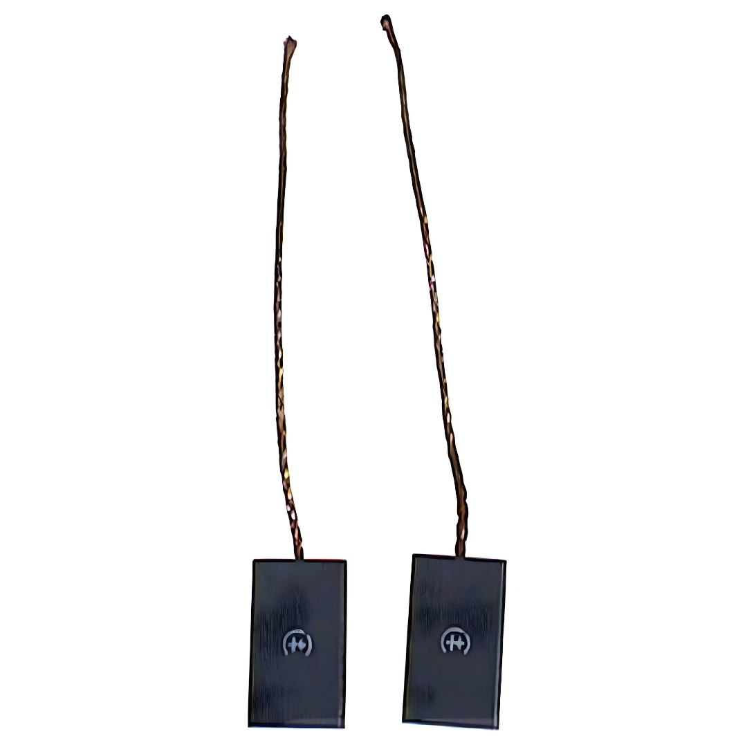 Two black alternator brushes with sticks on a white background