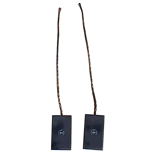 Two black alternator brushes with sticks on a white background