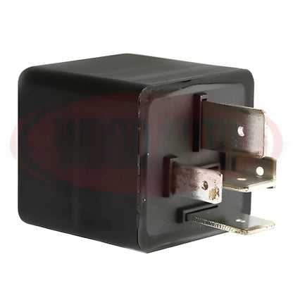 Black relay component on a white background