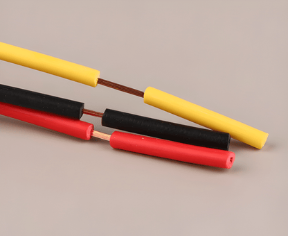 Detailed view of the high-efficiency copper wiring with red, black, and yellow color-coded insulation for easy identification during installation.