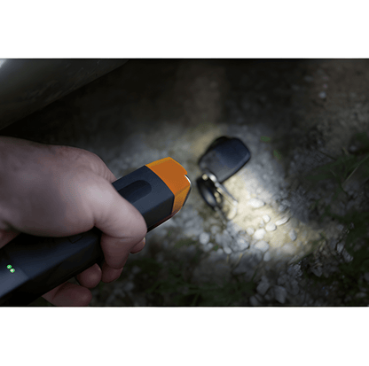 Hand holding Maypole MP4057 LED Slimline Foldable Inspection Hand Lamp Wand with LED Torch shining on keys