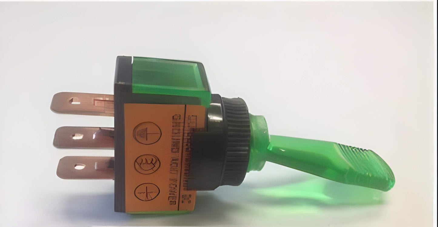 green on off toggle switch on a white background with 3 copper terminals