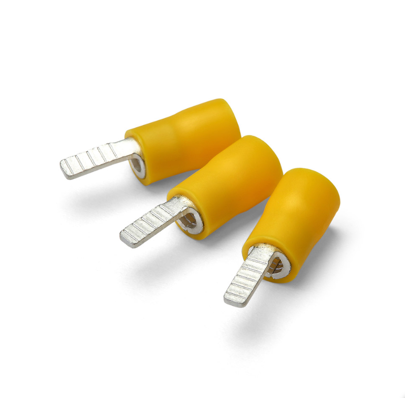 3 pre insulated yellow blade terminals on a white background