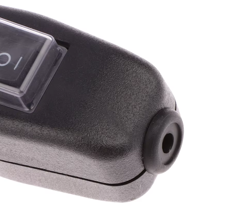 Close-up of a black plastic MURE inline waterproof 2-pin cordsitch with an on off rocker switch