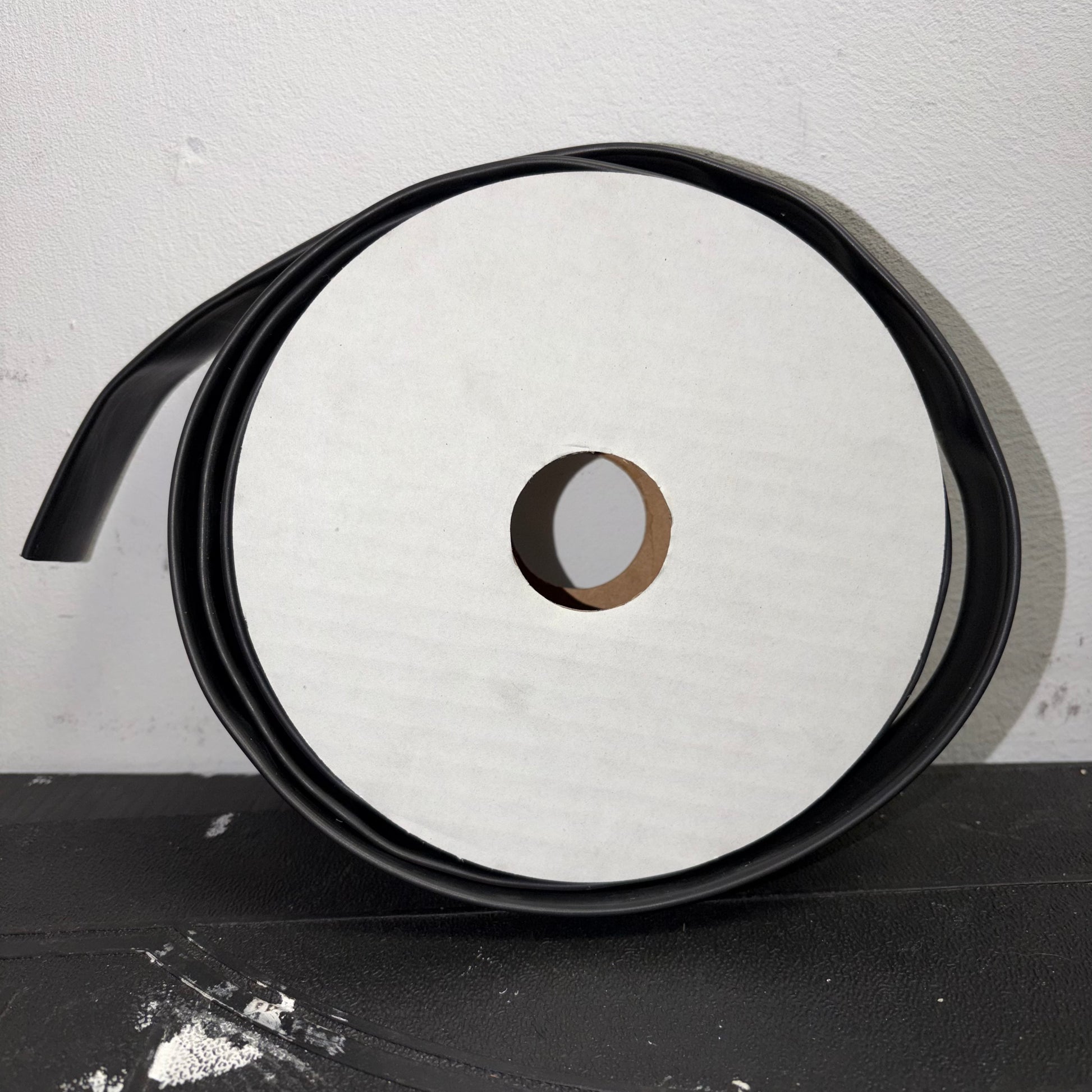 Black Dual Wall Adhesive Lined Heatshrink Tubing Spool Side Angle View