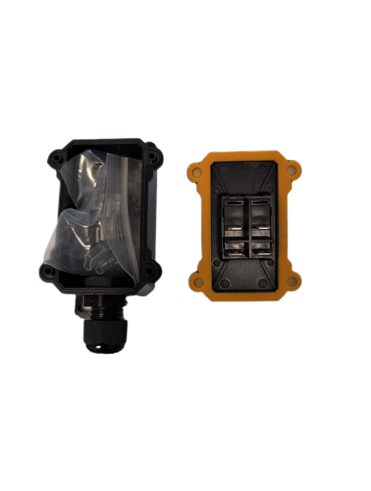 Two industrial electrical components on a white background: a black waterproof junction box with a clear protective film on the left, and a black double-pole switch module with a yellow-orange protective frame on the right.