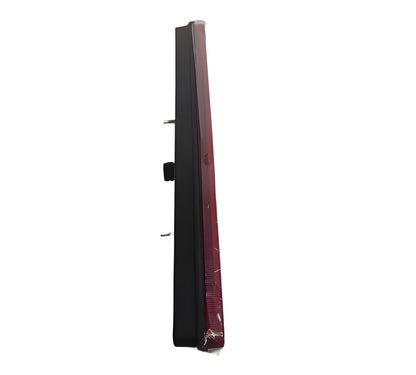 Tall, thin electronic device with a black and red design on a white background
