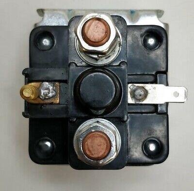 bottom view of a starter motor solenoid on a white background 